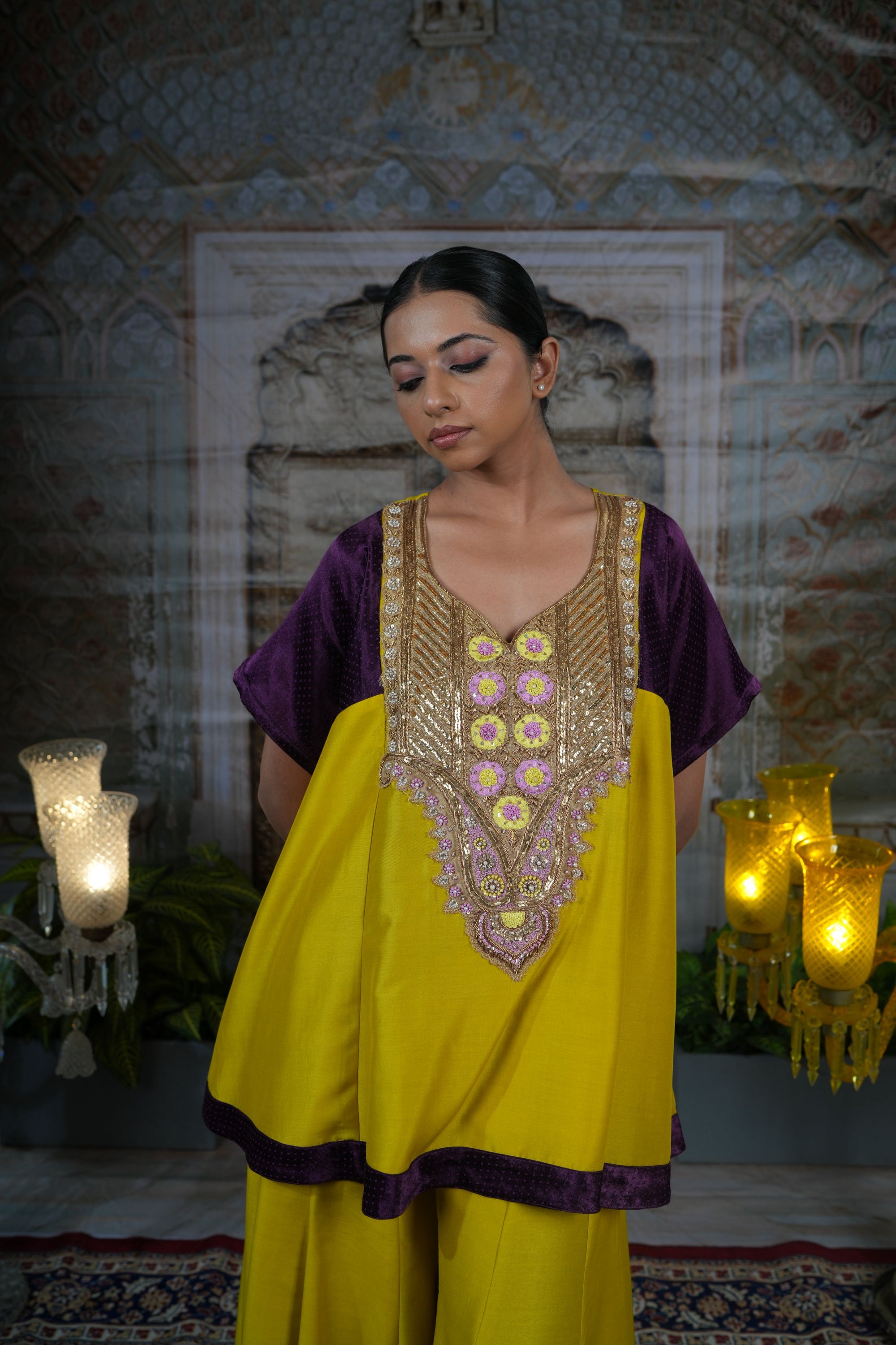 Mustard yellow top with flared pants