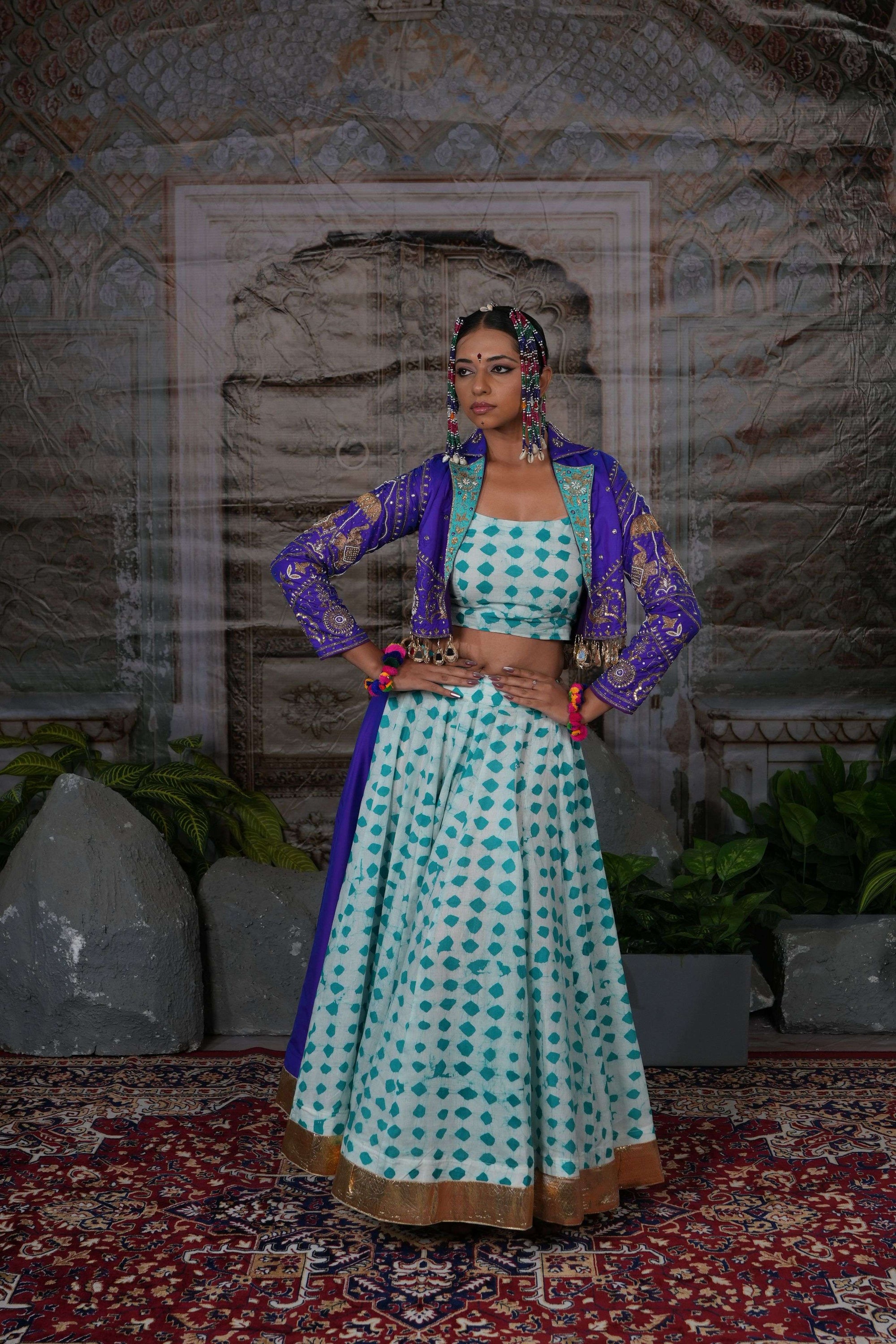 Printed flared lehenga with hand embroidered jacket with mirror latkans