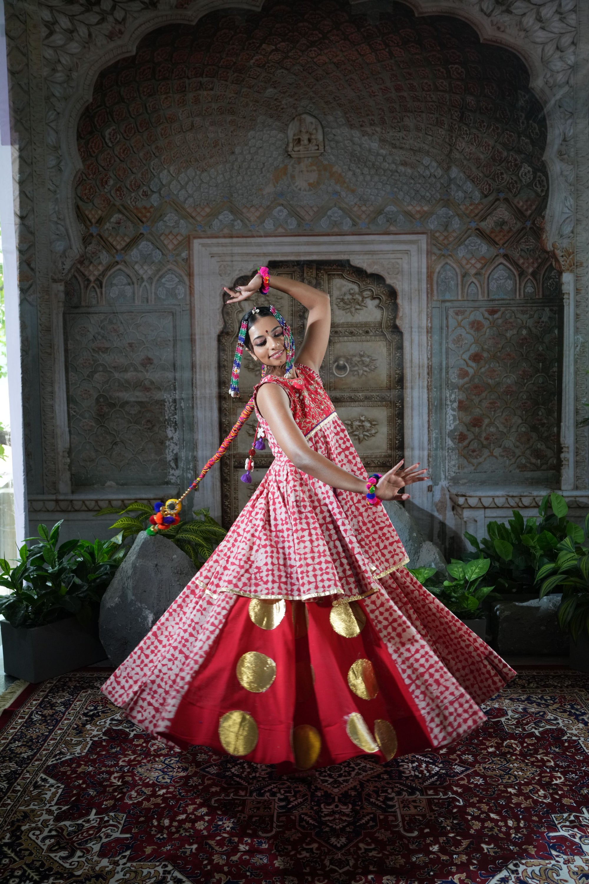 Printed peplum top with gota patch and flared lehenga