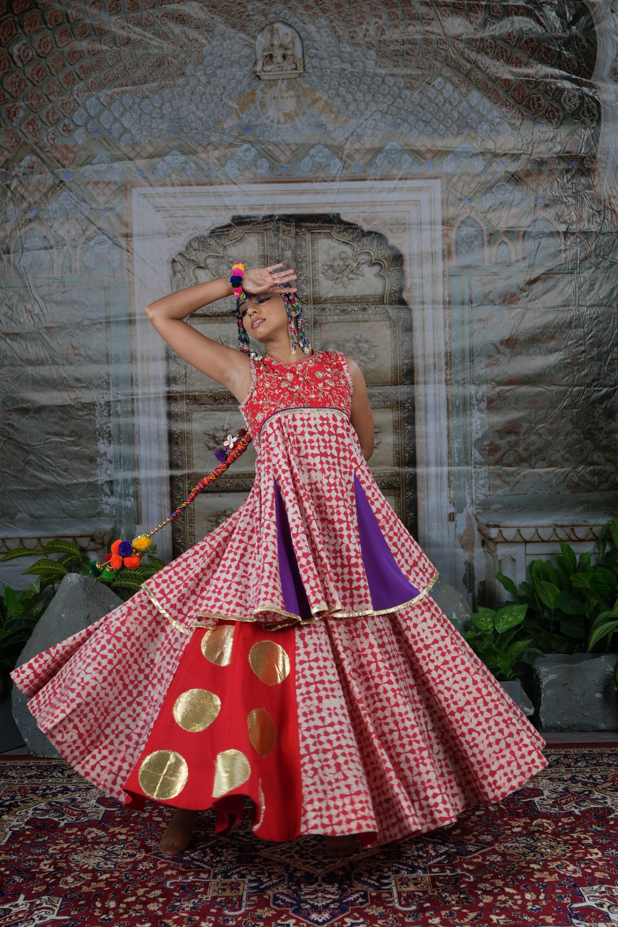 Printed peplum top with gota patch and flared lehenga