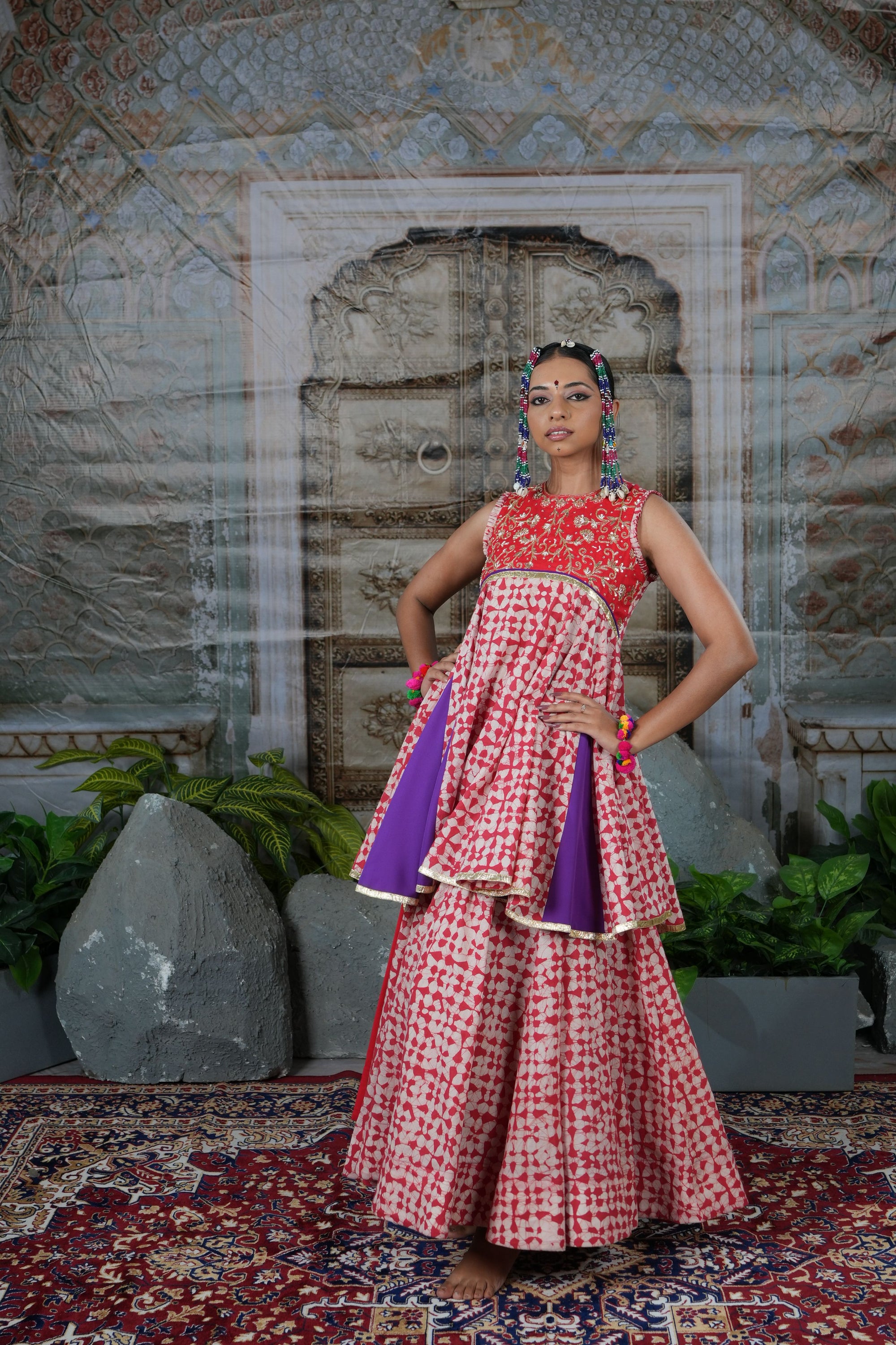 Printed peplum top with gota patch and flared lehenga