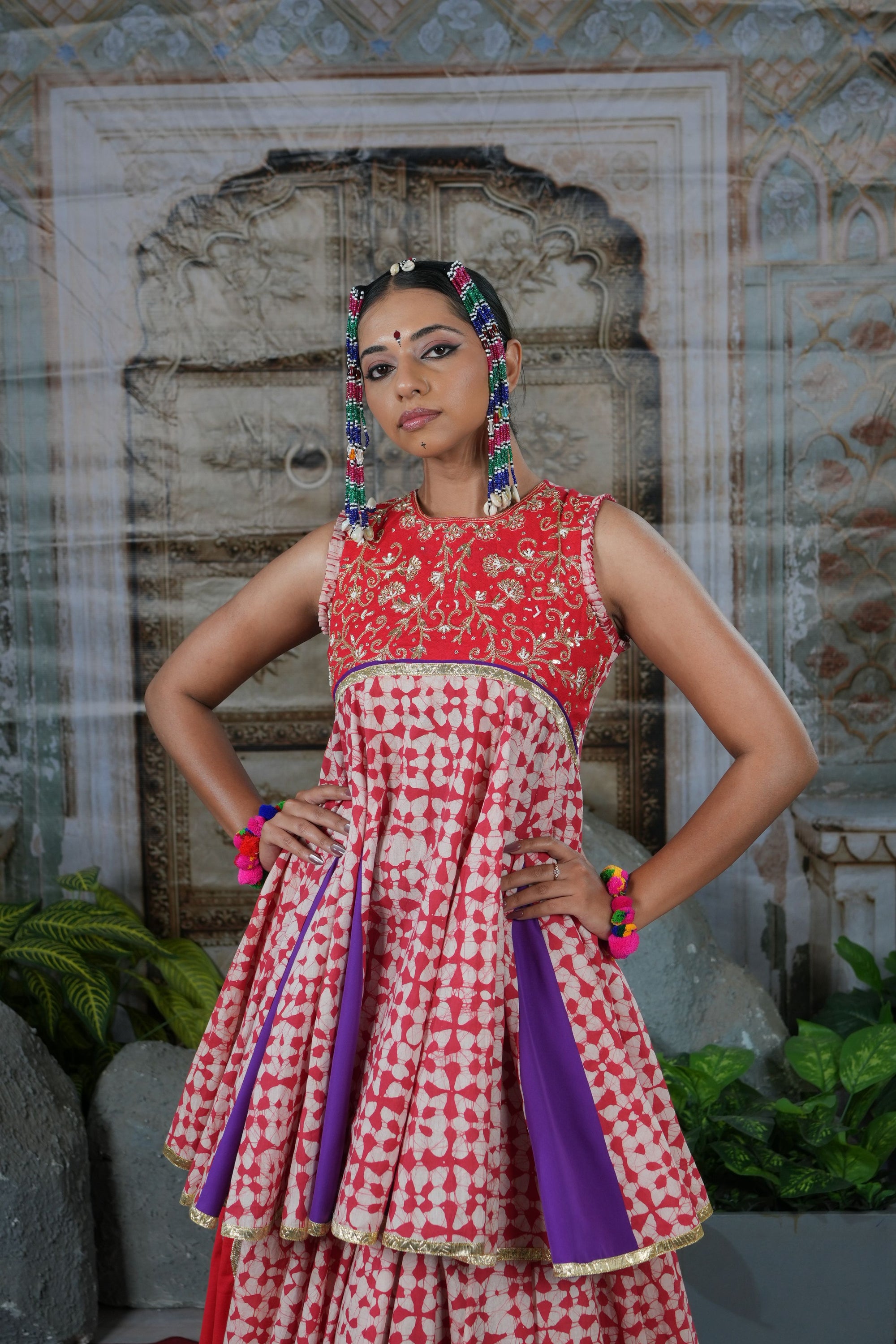 Printed peplum top with gota patch and flared lehenga