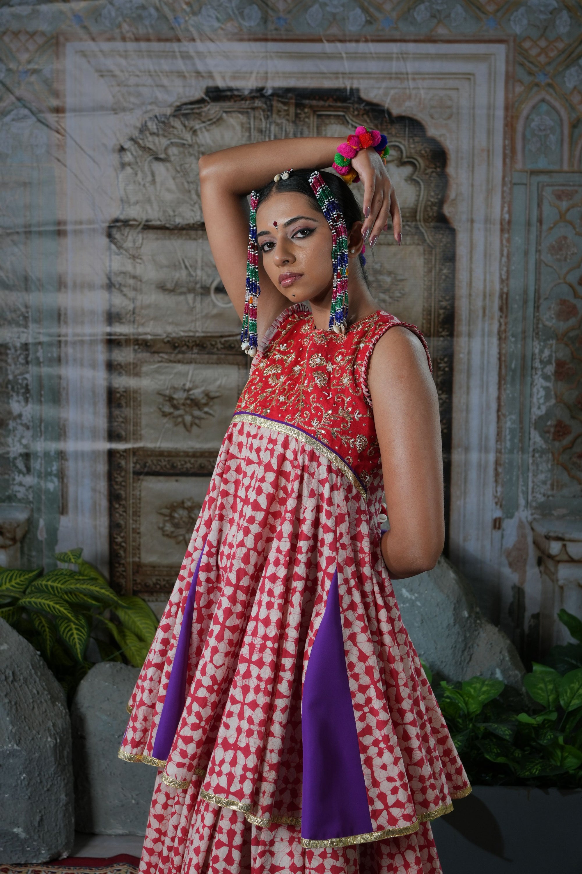 Printed peplum top with gota patch and flared lehenga