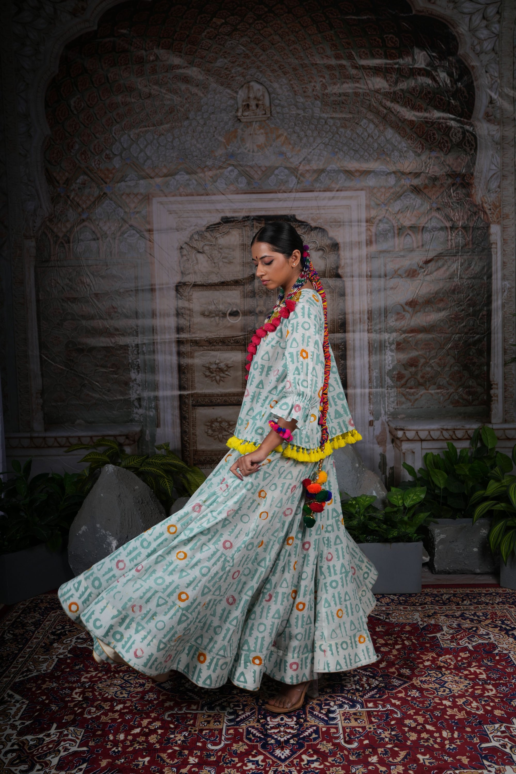 Printed lehnga set with hand work on the yoke
