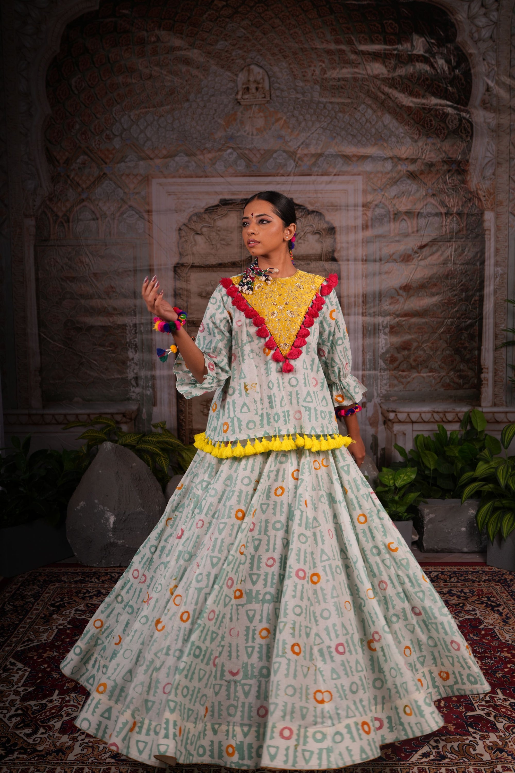 Printed lehnga set with hand work on the yoke