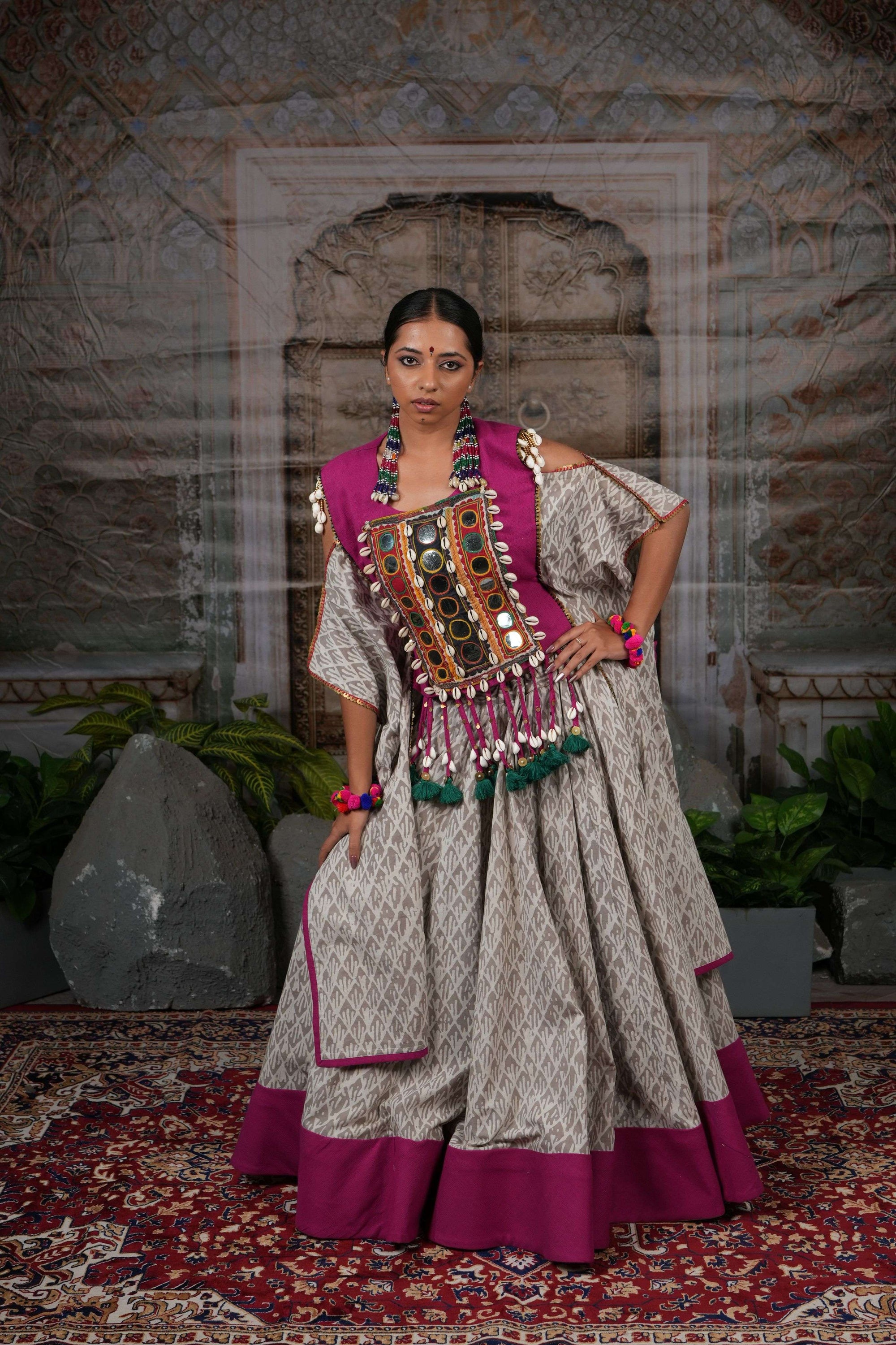 Tribal mirror work adjustable cape top with flared printed lehenga