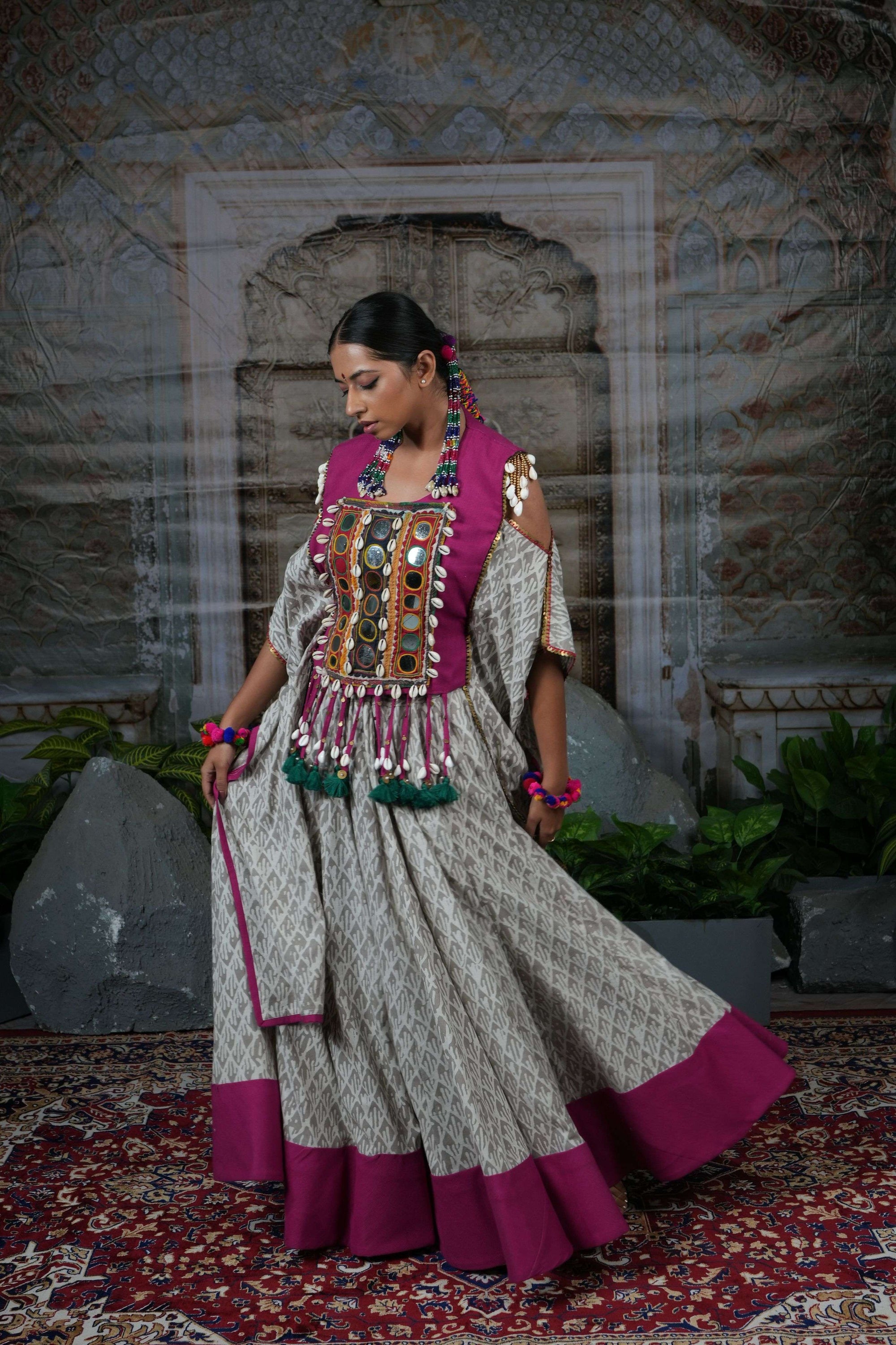 Tribal mirror work adjustable cape top with flared printed lehenga