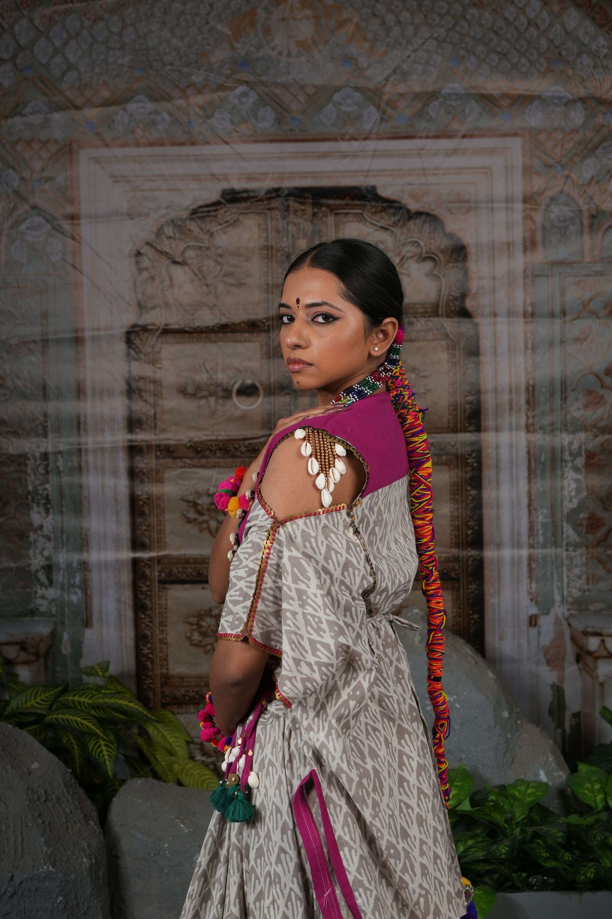 Tribal mirror work adjustable cape top with flared printed lehenga