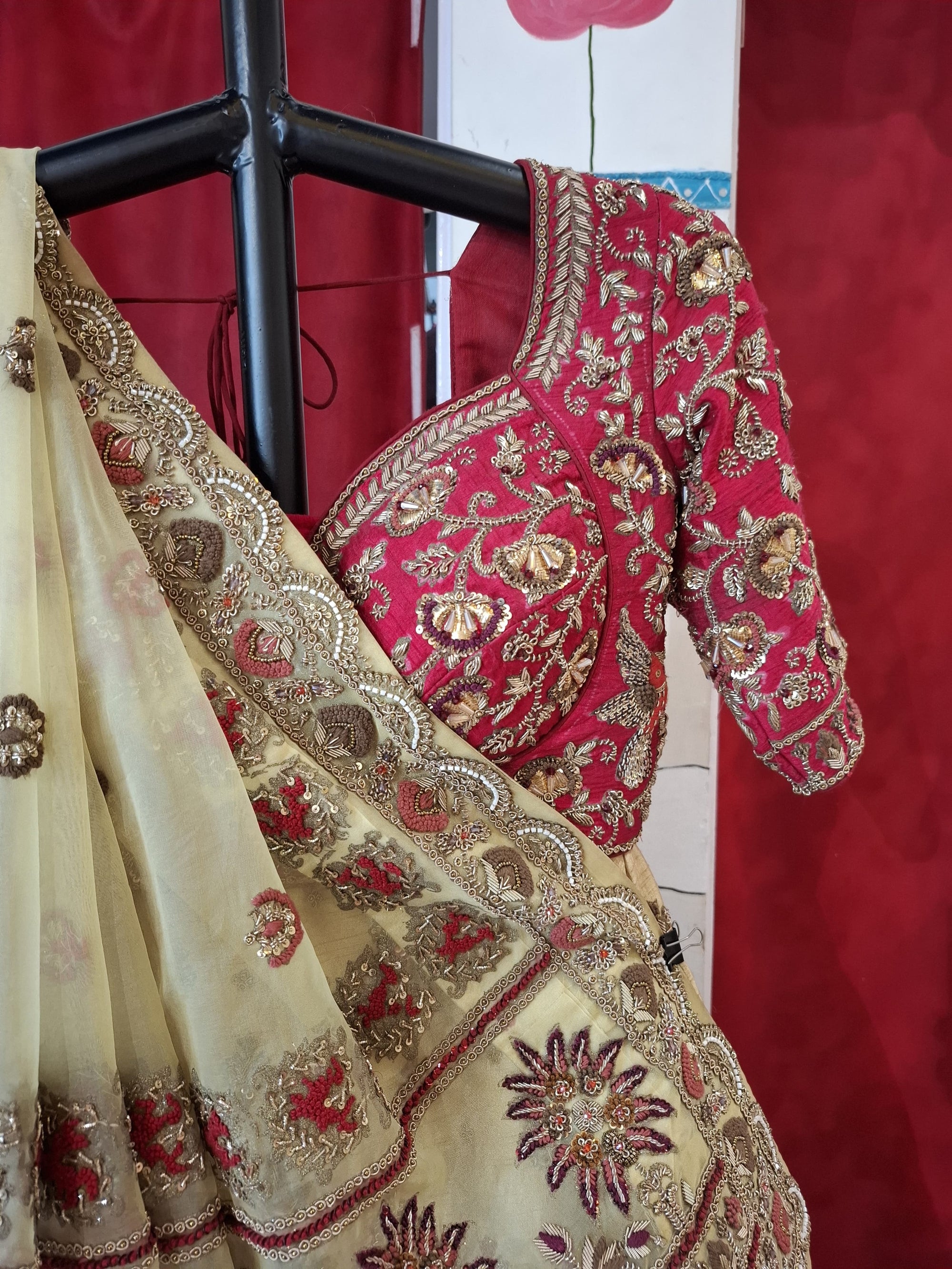 Beige gold red bridal lehnga