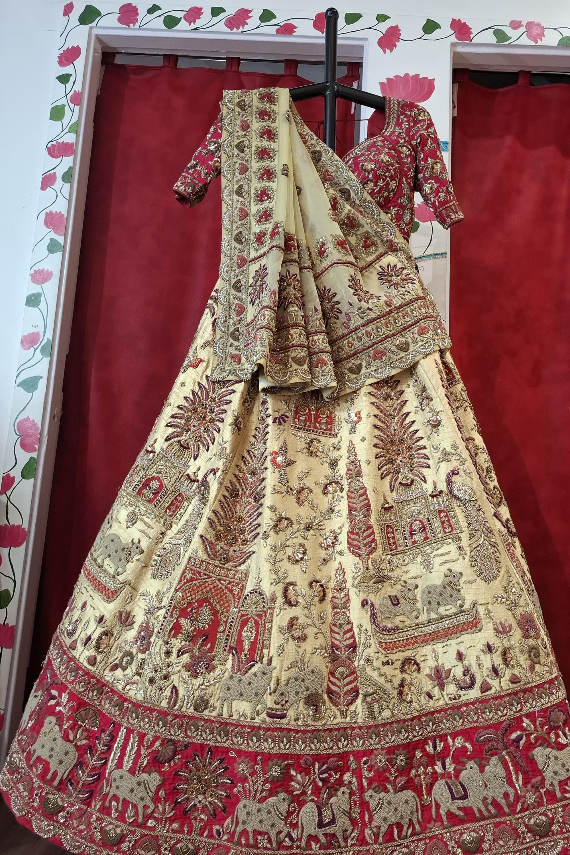 Beige gold red bridal lehnga