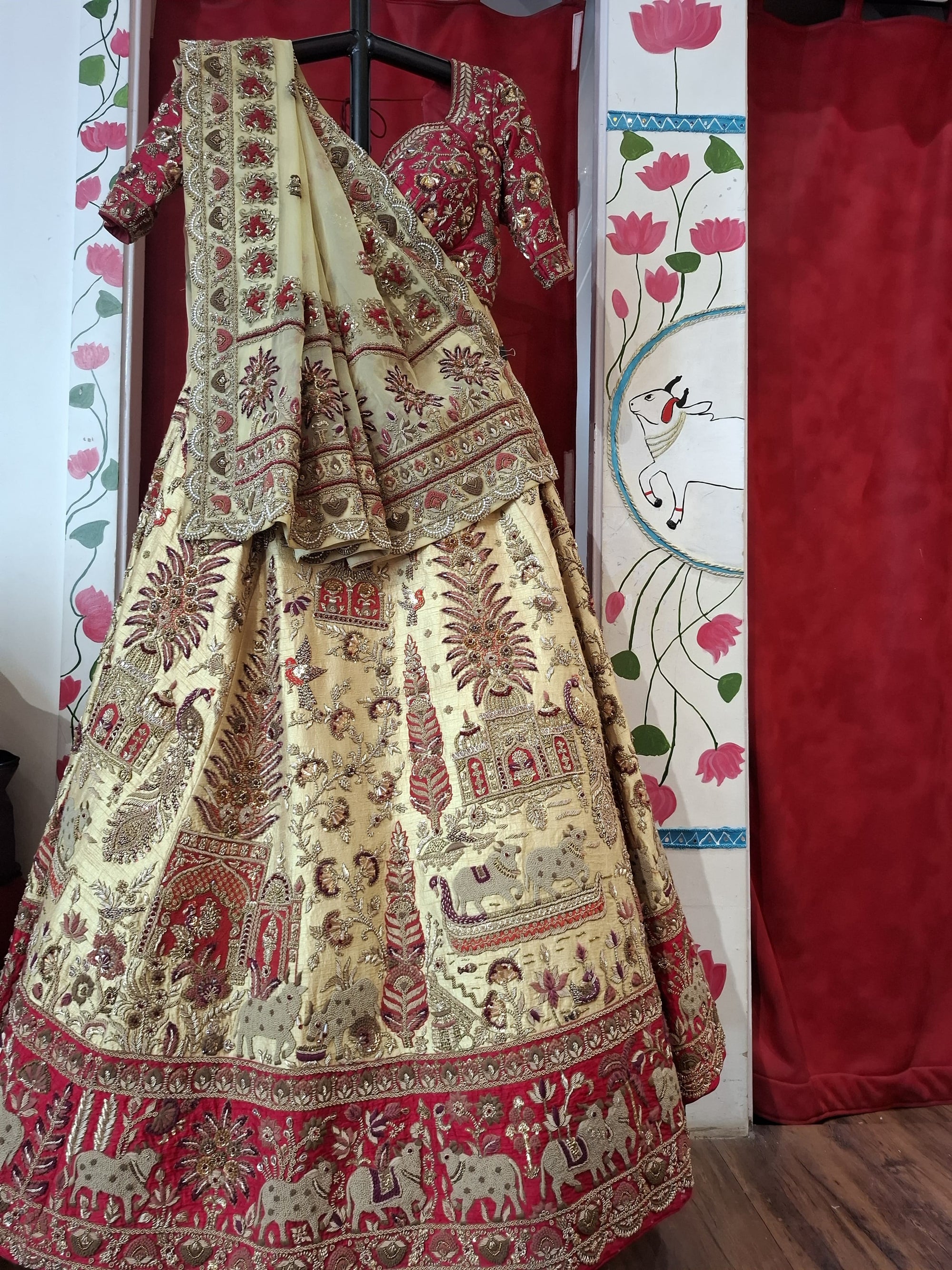 Beige gold red bridal lehnga