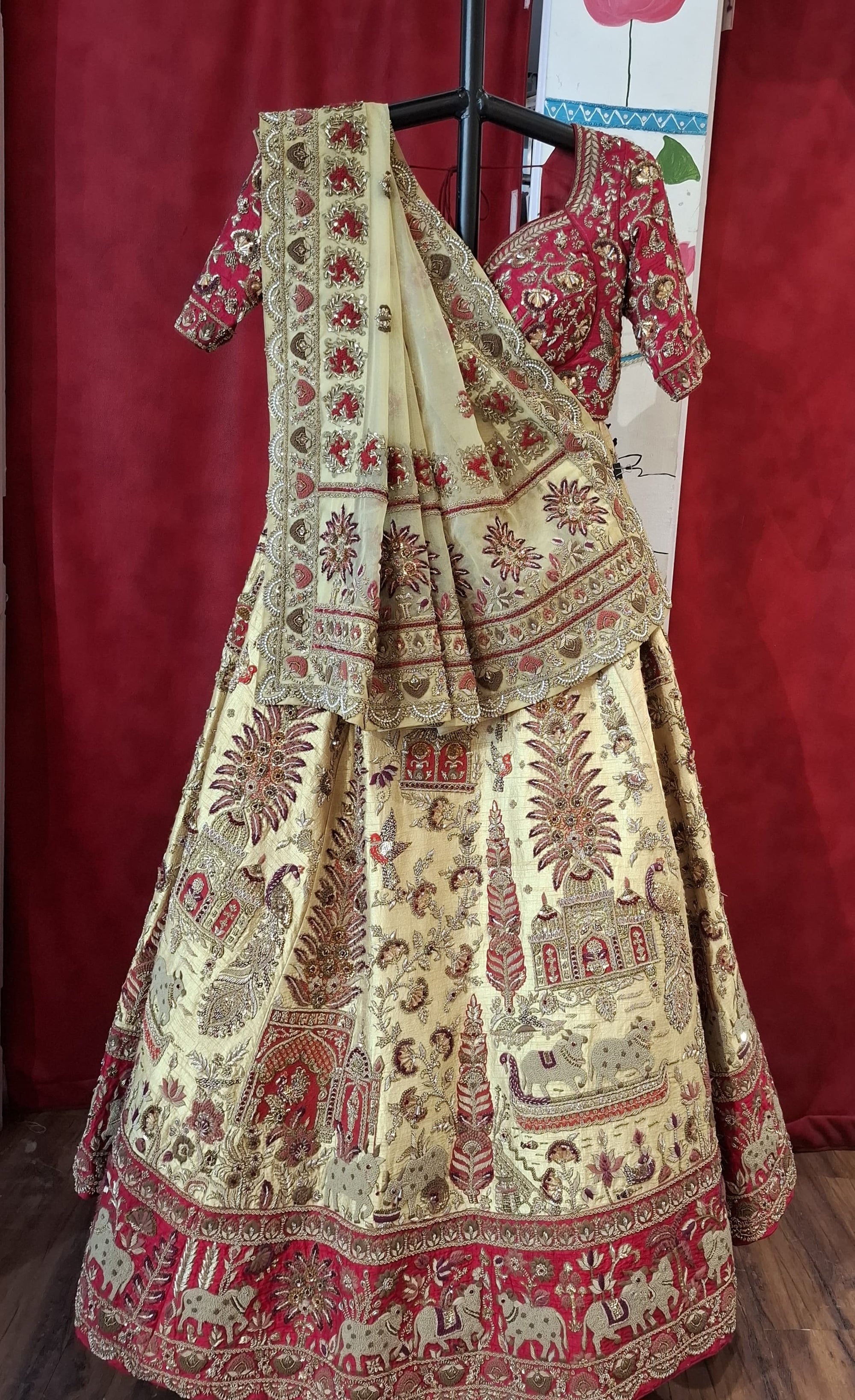 Beige gold red bridal lehnga